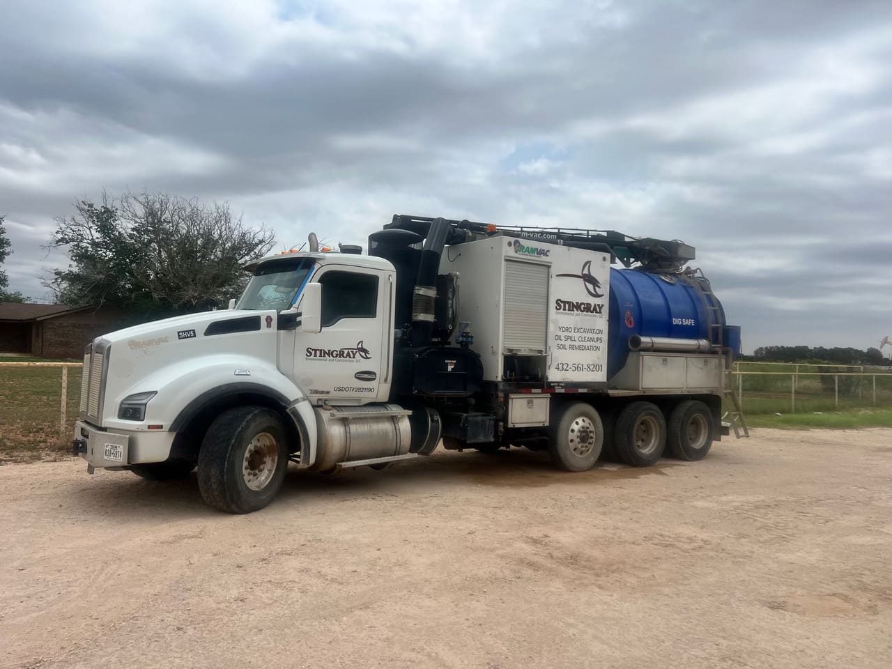 A large truck is parked on the side of the road.